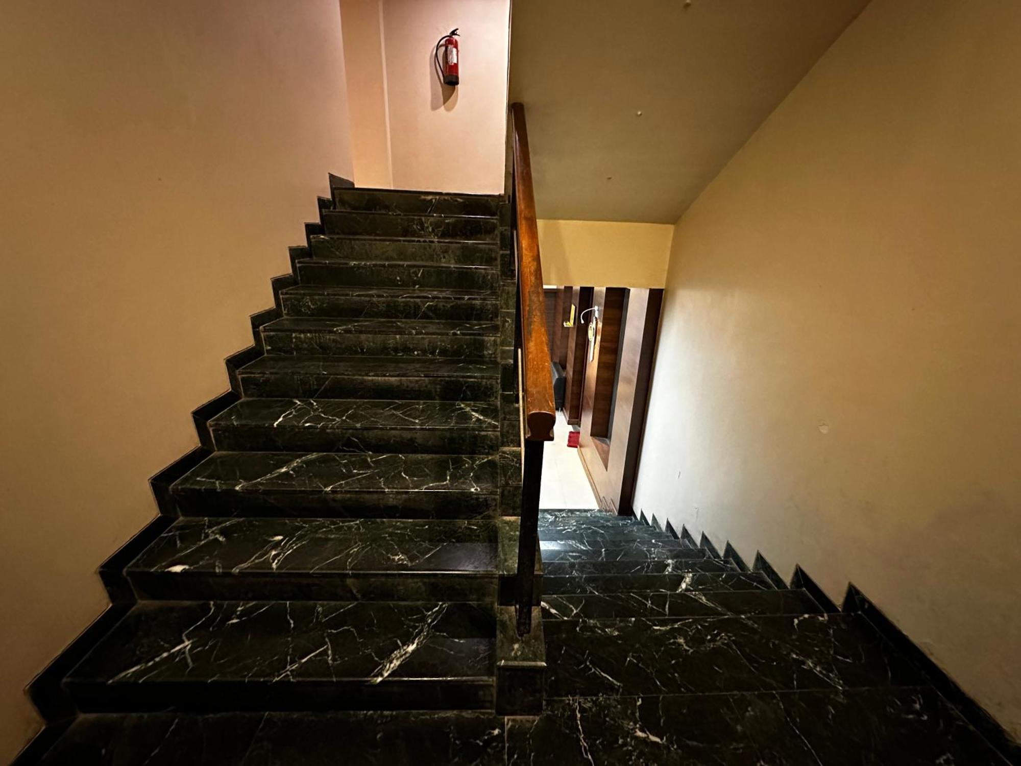 The Saffron Suites Sasupada Bagian luar foto